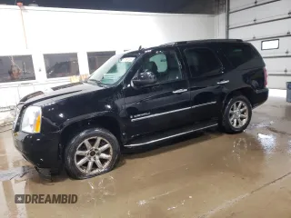 2009 GMC Yukon Denali z VIN 1GKFK03279R282409, wystawiony jako Copart lot #51534755 z przebiegiem 197 150 mil mil oraz Tytuł czysty. Historia ofert i sprzedaży dostępna na DreamBid. Obrazek 1.