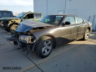 2006 Dodge Charger with VIN 2B3KA43G66H185893, listed as a Copart auction lot 82885564 with 165,129 mi miles and Salvage Title. Bid and sale history available at carsss.com. Image 1.