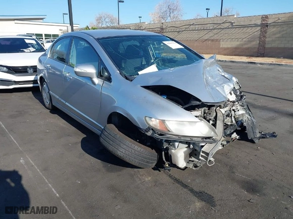 2010 Honda Civic Hybrid with VIN JHMFA3F24AS000539, listed as a IAAI auction lot 41993379 with 1 mi miles. Bid and sale history available at carsss.com. Image 1.
