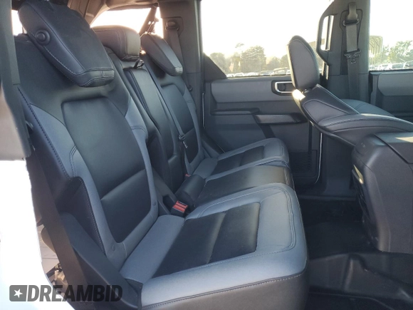 2024 Ford Bronco with VIN 1FMEE1BP9RLA57747, listed as a Copart auction lot 76117634 with 2,779 mi miles and Salvage title. Bid and sale history available at DreamBid. Image 11.