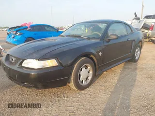 1999 Ford Mustang with VIN 1FAFP4047XF221818, listed as a IAAI auction lot 42261984 with 156,577 mi miles and . Bid and sale history available at DreamBid. Image 2.