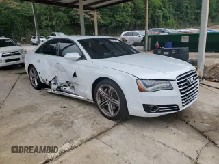 2013 Audi A8 4.0L with VIN WAUA2AFD9DN026942, listed as a Copart auction lot 60319565 with 122,341 mi miles and Salvage title. Bid and sale history available at DreamBid. Image 4.
