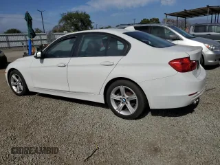 2015 BMW 3 Series 328i with VIN WBA3C1C51FP852825, listed as a Copart auction lot 53169305 with 184,383 mi miles and Salvage title. Bid and sale history available at DreamBid. Image 2.