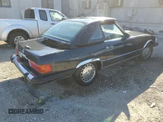 1987 Mercedes-Benz 560 SL with VIN WDBBA48D1HA072141, listed as a Copart auction lot 79715724 with 88,545 mi miles and Salvage Title. Bid and sale history available at DreamBid. Image 3.