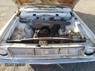1966 Dodge Dart z VIN LH41B65160290, wystawiony jako Copart lot #81000364 z przebiegiem 36 533 mil mil oraz Tytuł czysty. Historia ofert i sprzedaży dostępna na DreamBid. Obrazek 11.