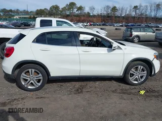 2016 Mercedes-Benz GLA 250 z VIN WDCTG4EB4GJ258174, wystawiony jako IAAI lot #41595364 z przebiegiem 112 649 mil mil oraz . Historia ofert i sprzedaży dostępna na DreamBid. Obrazek 13.