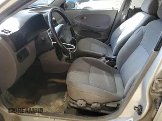 2002 Kia Rio with VIN KNADC123326133077, listed as a Copart auction lot 52427975 with 105,357 mi miles and Salvage Title. Bid and sale history available at carsss.com. Image 7.