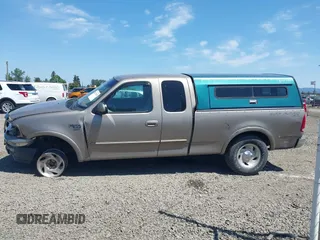 2001 Ford F-150 XL z VIN 2FTRX18L61CA78784, wystawiony jako IAAI lot #42228289 z przebiegiem 208 507 mil mil oraz . Historia ofert i sprzedaży dostępna na DreamBid. Obrazek 14.