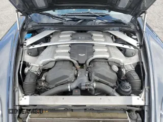 2007 Aston Martin DB9 z VIN SCFAD01A77GA07808, wystawiony jako Copart lot #48063115 z przebiegiem 53 195 mil mil oraz Szkody całkowita. Historia ofert i sprzedaży dostępna na DreamBid. Obrazek 11.