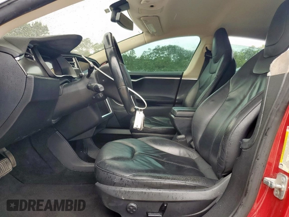 2014 Tesla Model S 60 with VIN 5YJSA1H11EFP43669, listed as a Copart auction lot 62368605 with Not provided miles and Salvage title. Bid and sale history available at DreamBid. Image 7.