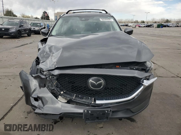 2017 Mazda CX-5 Grand Touring with VIN JM3KFBDL4H0163339, listed as a Copart auction lot 50566495 with 83,453 mi miles and Salvage Title. Bid and sale history available at carsss.com. Image 5.
