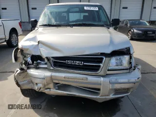 1999 Isuzu Trooper S with VIN JACDJ58X6X7924973, listed as a Copart auction lot 57881235 with 269,301 mi miles and Salvage title. Bid and sale history available at DreamBid. Image 5.