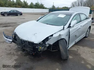 2015 Hyundai Sonata Hybrid Limited with VIN KMHEC4A45FA051854, listed as a IAAI auction lot 41853648 with 160,422 mi miles. Bid and sale history available at carsss.com. Image 6.