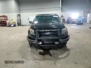 2014 Ford Utility Police Interceptor with VIN 1FM5K8AR3EGA04453, listed as a Copart auction lot 87294124 with 200,560 mi miles and Salvage Title. Bid and sale history available at carsss.com. Image 12.