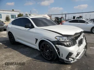 2022 BMW X4 M z VIN 5YM23EC01N9J82231, wystawiony jako Copart lot #43271695 z przebiegiem 20 715 mil mil oraz Szkody całkowita. Historia ofert i sprzedaży dostępna na DreamBid. Obrazek 4.