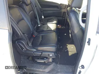 2023 Honda Odyssey Touring with VIN 5FNRL6H81PB008129, listed as a IAAI auction lot 41610714 with 57,273 mi miles and . Bid and sale history available at DreamBid. Image 8.