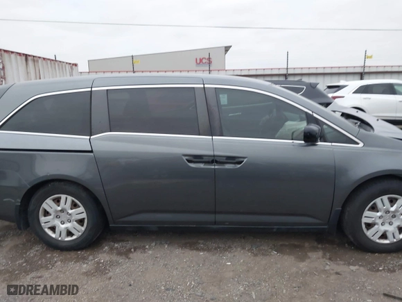 2013 Honda Odyssey LX with VIN 5FNRL5H24DB042230, listed as a IAAI auction lot 40954067 with 212,154 mi miles. Bid and sale history available at carsss.com. Image 14.