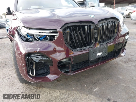 2021 BMW X5 M50i with VIN 5UXJU4C04M9G03418, listed as a IAAI auction lot 40705167 with 24,073 mi miles and . Bid and sale history available at DreamBid. Image 6.