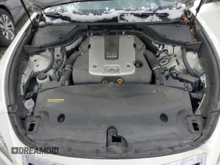 2015 Infiniti Q70 z VIN JN1BY1AR7FM560994, wystawiony jako Copart lot #86988034 z przebiegiem 92 028 mil mil oraz Szkoda całkowita • Salvage title. Historia ofert i sprzedaży dostępna na DreamBid. Obrazek 11.