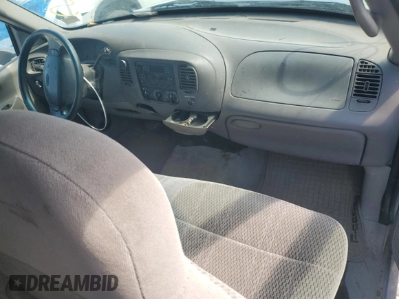 1997 Ford F-150 with VIN 1FTDX076XVKC72073, listed as a Copart auction lot 62774955 with 204,105 mi miles and Salvage title. Bid and sale history available at DreamBid. Image 8.