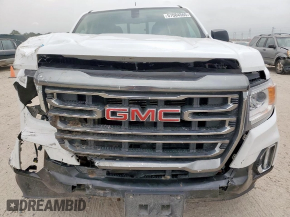 2022 GMC Canyon 4WD AT4 z VIN 1GTG6FEN2N1210072, wystawiony jako Copart lot #57084565 z przebiegiem 64 897 mil mil oraz Szkoda całkowita • Salvage title. Historia ofert i sprzedaży dostępna na DreamBid. Obrazek 5.