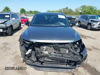 2020 Volkswagen Tiguan SE with VIN 3VV3B7AX3LM176300, listed as a IAAI auction lot 42004744 with 86,074 mi miles and . Bid and sale history available at DreamBid. Image 12.