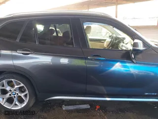 2013 BMW X1 28i with VIN WBAVM1C57DVW42096, listed as a IAAI auction lot 41572971 with 156,999 mi miles. Bid and sale history available at carsss.com. Image 12.
