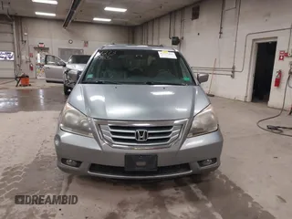 2009 Honda Odyssey EX-L with VIN 5FNRL38789B015524, listed as a IAAI auction lot 42135465 with 242,005 mi miles. Bid and sale history available at carsss.com. Image 13.