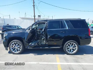2016 Chevrolet Tahoe LT z VIN 1GNSCBKC7GR311313, wystawiony jako IAAI lot #42303467 z przebiegiem 90 889 mil mil oraz . Historia ofert i sprzedaży dostępna na DreamBid. Obrazek 6.