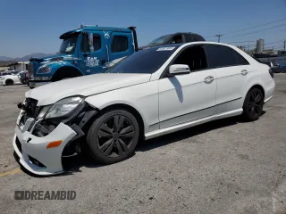 2013 Mercedes-Benz E 400 Sport z VIN WDDHF9FB8DA740688, wystawiony jako Copart lot #64991965 z przebiegiem 134 633 mil mil oraz Szkoda całkowita • Salvage title. Historia ofert i sprzedaży dostępna na DreamBid. Obrazek 1.