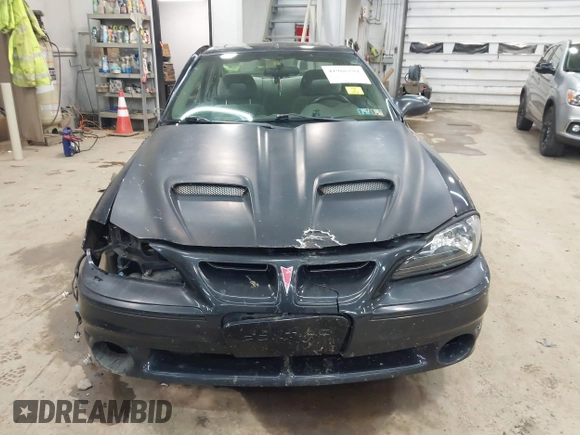 2005 Pontiac Grand Am GT with VIN 1G2NW12E85M140434, listed as a IAAI auction lot 41966294 with 142,548 mi miles. Bid and sale history available at carsss.com. Image 12.