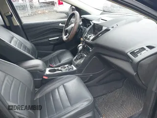 2014 Ford Escape Titanium with VIN 1FMCU9J99EUD38866, listed as a IAAI auction lot 42052579 with 202,337 mi miles. Bid and sale history available at carsss.com. Image 5.
