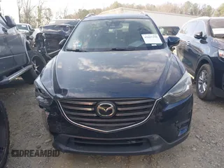 2016 Mazda CX-5 Grand Touring with VIN JM3KE2DY1G0708572, listed as a IAAI auction lot 41685298 with 109,427 mi miles. Bid and sale history available at carsss.com. Image 12.