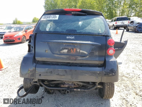 2009 Smart fortwo Pure z VIN WMEEJ31X09K267836, wystawiony jako Copart lot #55500135 z przebiegiem Nie podano mil oraz Szkoda całkowita • Salvage title. Historia ofert i sprzedaży dostępna na DreamBid. Obrazek 6.