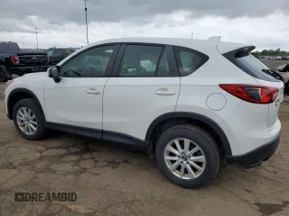 2014 Mazda CX-5 Sport with VIN JM3KE2BE8E0374434, listed as a Copart auction lot 61615445 with 111,330 mi miles and Clean title. Bid and sale history available at DreamBid. Image 2.