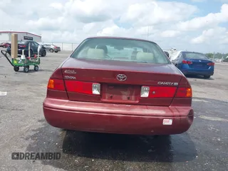 2000 Toyota Camry CE z VIN JT2BG22K3Y0521541, wystawiony jako IAAI lot #42074772 z przebiegiem 144 587 mil mil oraz . Historia ofert i sprzedaży dostępna na DreamBid. Obrazek 16.