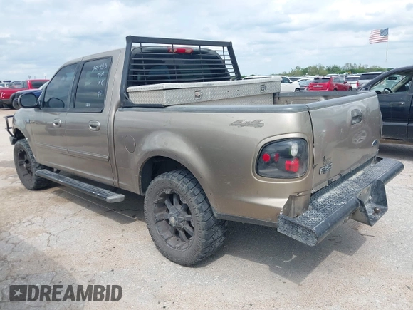2003 Ford F-150 XLT with VIN 1FTRW08653KA87935, listed as a IAAI auction lot 42101353 with 1 mi miles. Bid and sale history available at carsss.com. Image 3.