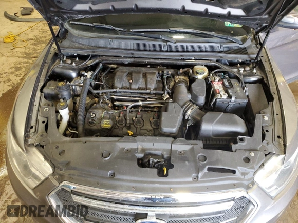 2014 Ford Taurus Limited with VIN 1FAHP2F8XEG113644, listed as a Copart auction lot 51275645 with 143,816 mi miles and Salvage title. Bid and sale history available at DreamBid. Image 11.
