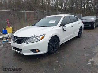 2018 Nissan Altima 2.5 SL with VIN 1N4AL3AP3JC163577, listed as a IAAI auction lot 41406241 with 138,214 mi miles. Bid and sale history available at carsss.com. Image 17.