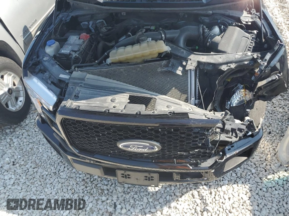 2020 Ford F-150 XL с VIN 1FTEW1EP7LKD06704, выставлен на аукционе Copart как лот 59968725 с пробегом 131 161 миль миль и Списание • Salvage title. История ставок и продаж доступна на DreamBid. Изображение 11.