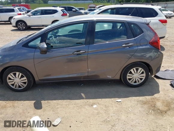 2015 Honda Fit LX with VIN 3HGGK5G57FM747786, listed as a IAAI auction lot 42656703 with 102,637 mi miles and . Bid and sale history available at DreamBid. Image 14.