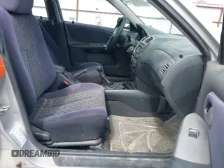 2002 Mazda Protege LX z VIN JM1BJ226X20523807, wystawiony jako IAAI lot #42373241 z przebiegiem 218 634 mil mil oraz . Historia ofert i sprzedaży dostępna na DreamBid. Obrazek 5.