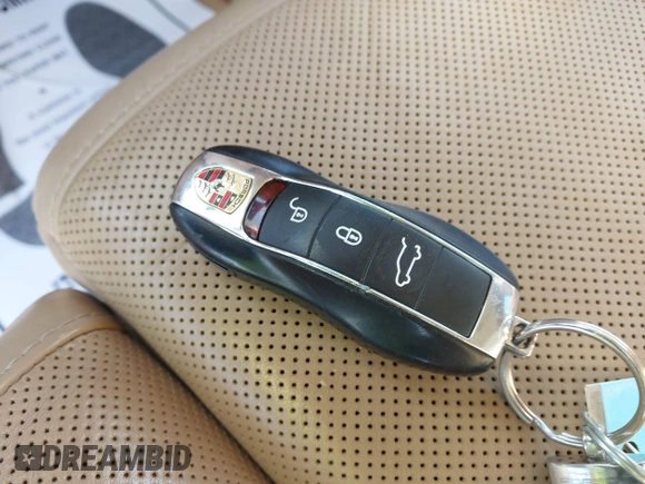 2014 Porsche Cayenne with VIN WP1AA2A2XELA95734, listed as a IAAI auction lot 41583908 with 95,751 mi miles and . Bid and sale history available at DreamBid. Image 11.