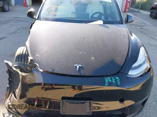 2020 Tesla Model Y Long Range with VIN 5YJYGDEF2LF037298, listed as a IAAI auction lot 37832056 with 40,417 mi miles and . Bid and sale history available at DreamBid. Image 10.