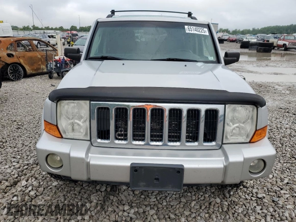 2007 Jeep Commander Sport z VIN 1J8HG48K97C598103, wystawiony jako Copart lot #65140225 z przebiegiem 204 638 mil mil oraz Czysty tytuł • Clean title. Historia ofert i sprzedaży dostępna na DreamBid. Obrazek 5.