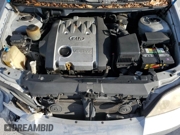 2005 Kia Sedona LX with VIN KNDUP132356769452, listed as a Copart auction lot 82835494 with 93,845 mi miles and Salvage Title. Bid and sale history available at carsss.com. Image 12.