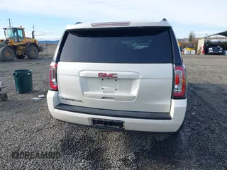 2015 GMC Yukon XL SLT with VIN 1GKS2HKC3FR586338, listed as a IAAI auction lot 41632662 with 149,133 mi miles. Bid and sale history available at carsss.com. Image 16.