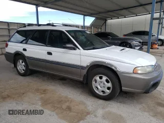 1997 Subaru Legacy Outback with VIN 4S3BG685XV6602836, listed as a Copart auction lot 47376925 with 236,913 mi miles and Salvage title. Bid and sale history available at DreamBid. Image 4.