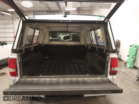 2010 Ford Ranger XLT with VIN 1FTLR4FE4APA76083, listed as a IAAI auction lot 39763204 with 180,324 mi miles and . Bid and sale history available at DreamBid. Image 18.