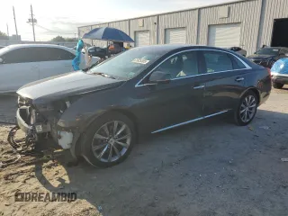2013 Cadillac XTS Luxury with VIN 2G61P5S32D9235227, listed as a Copart auction lot 61825305 with 59,853 mi miles and Salvage title. Bid and sale history available at DreamBid. Image 1.
